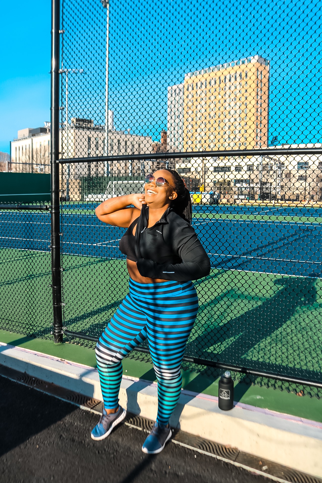 African and Boston blogger Binja wearing Danskin workout pants and Hind workout top #Africancocktail