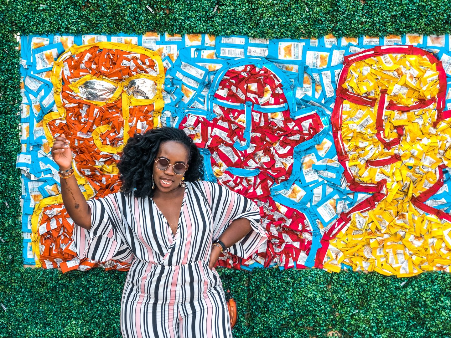 Boston based African blogger Binja, the Africancocktail, is wearing a stripped jumpsuit from Charlotte Russe. Africancocktail is in Busua, Ghana.